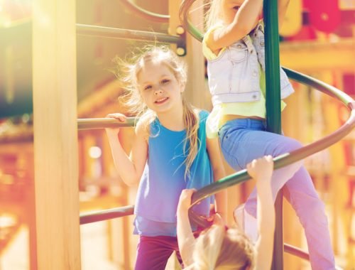 group-of-happy-kids-on-children-playground-P57YL4N.jpg